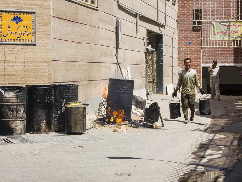 Making tar in the streets of Tehran