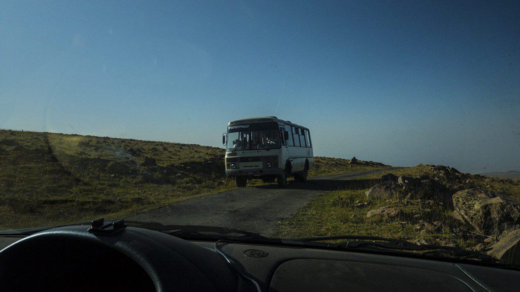 A minibus driving up Mt. Aragats